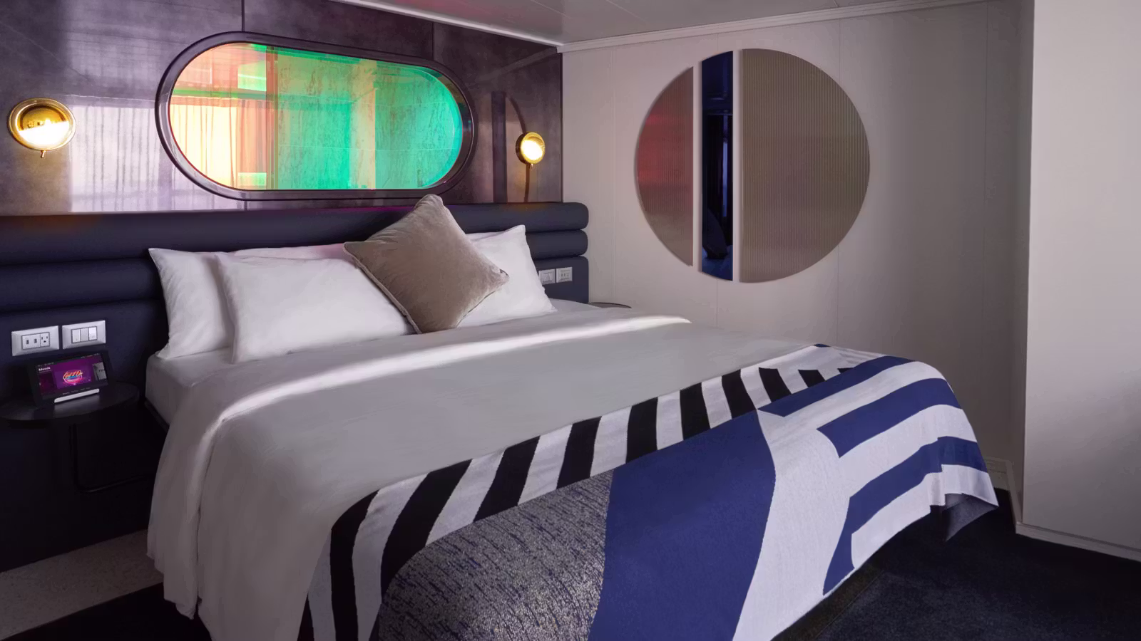 Seriously Suite bedroom with elevated finishes and a king bed