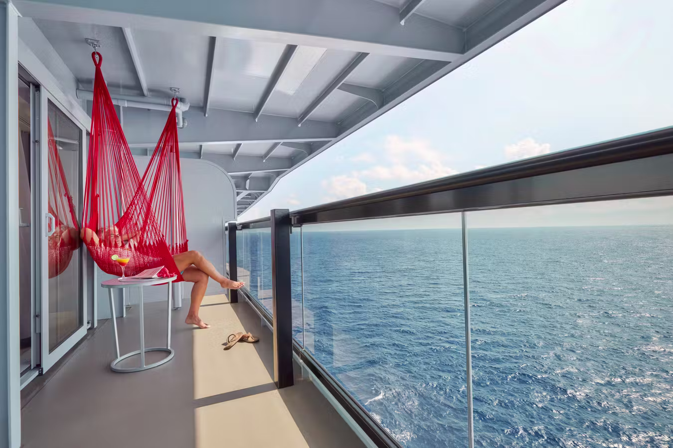 Seriously Suite private terrace with a red hammock and ocean view